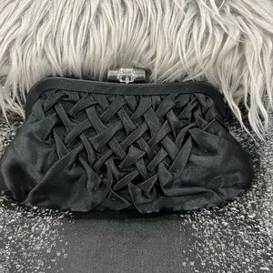 Party wear black clutch. Perfect with party dresses.